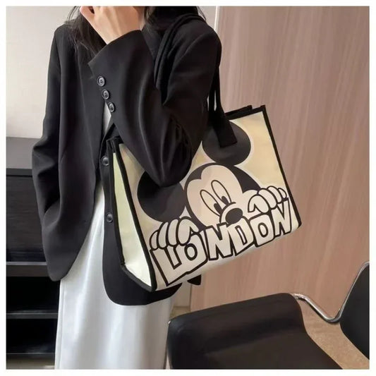 New Disney Mickey Canvas Bag Women's Versatile Casual Shoulder Bag Commuter Handbag Large Capacity Multifunctional Mommy Bag.