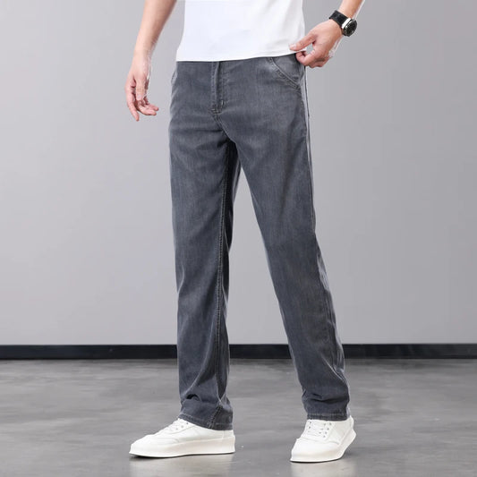 Summer Thin Men's Jeans Lyocell Fabric Soft Breathable Straight Denim Pants Brand Man Elastic Ice Silk Casual Trousers Grey Blue.