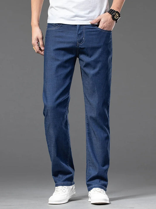 Summer Ultra Thin Men's Loose Jeans Lyocell Ice Silk Fashion Casual Business Denim Pants Straight Stretch Male Trousers.