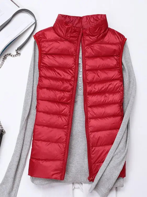 0-10 ℃ Frauen Westen Herbst Winter Ultra Licht Ente Unten Weste Weibliche Dünne Ärmellose Jacke Winddicht Warme Puffer Weste 4XL