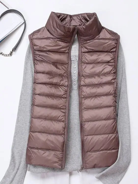 0-10 ℃ Frauen Westen Herbst Winter Ultra Licht Ente Unten Weste Weibliche Dünne Ärmellose Jacke Winddicht Warme Puffer Weste 4XL
