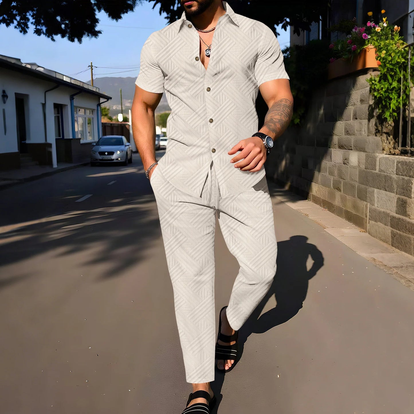 A fashionable and trendy two-piece short-sleeved shirtwithlong pants is perfect for men's daily casual wear in spring and autumn.