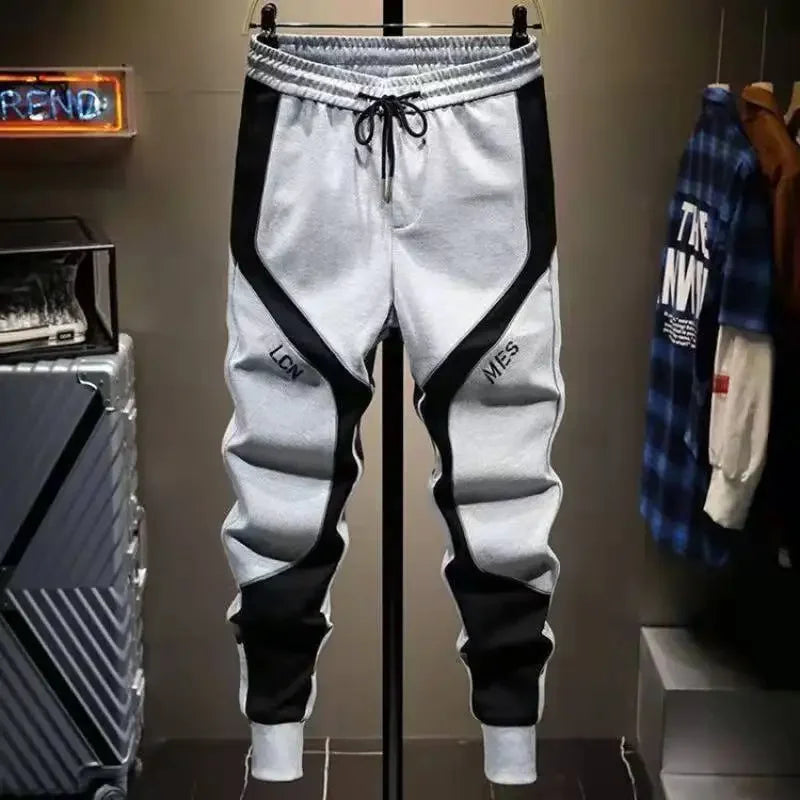 Lässige Herrenhose, koreanische trendige, locker sitzende Hose für dicke Leute, Herren-Jogginghose mit Gürtel und Spleißen.
