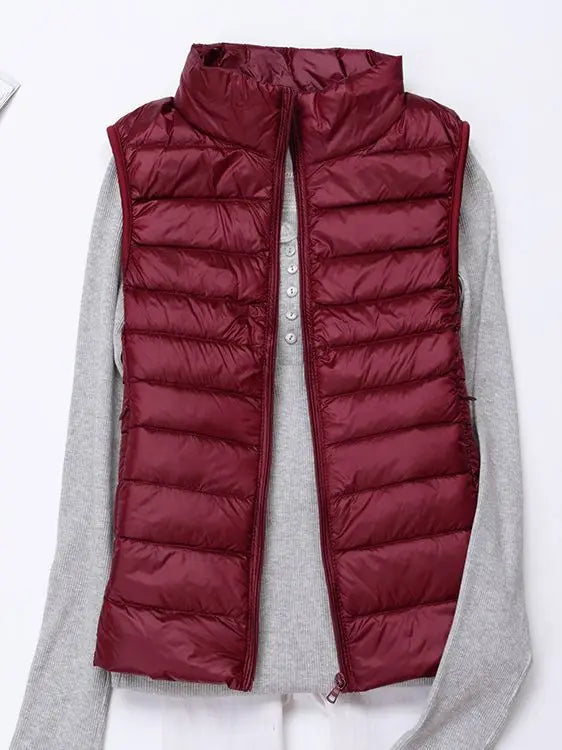 0-10 ℃ Frauen Westen Herbst Winter Ultra Licht Ente Unten Weste Weibliche Dünne Ärmellose Jacke Winddicht Warme Puffer Weste 4XL