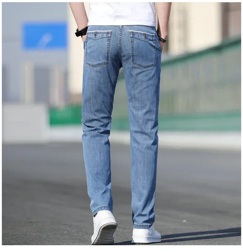 2025 sommer Neue männer Lose Grau Jeans Mode Lässig Stretch Gerade bein Denim Hosen Männlich Hellblau männer Hosen