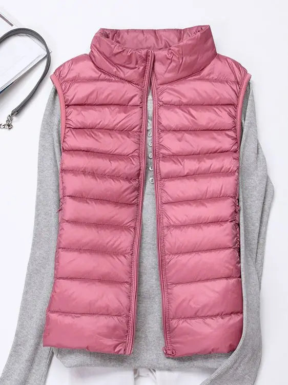 0-10 ℃ Frauen Westen Herbst Winter Ultra Licht Ente Unten Weste Weibliche Dünne Ärmellose Jacke Winddicht Warme Puffer Weste 4XL