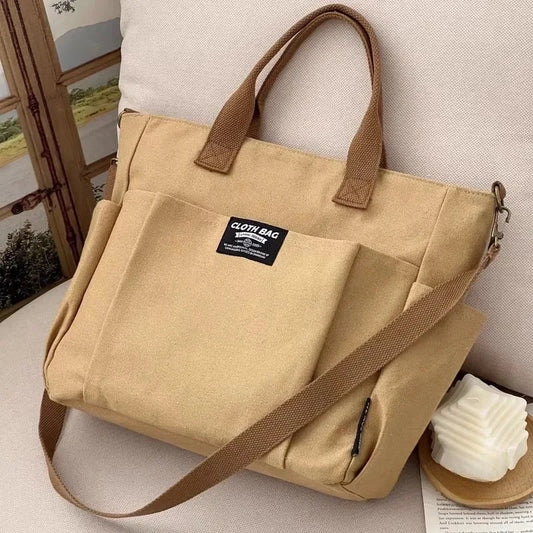 Urban Minimalist Female Student Large Capacity Commuting Horizontal Canvas Single Shoulder Diagonal Cross Portable Tote Bag.