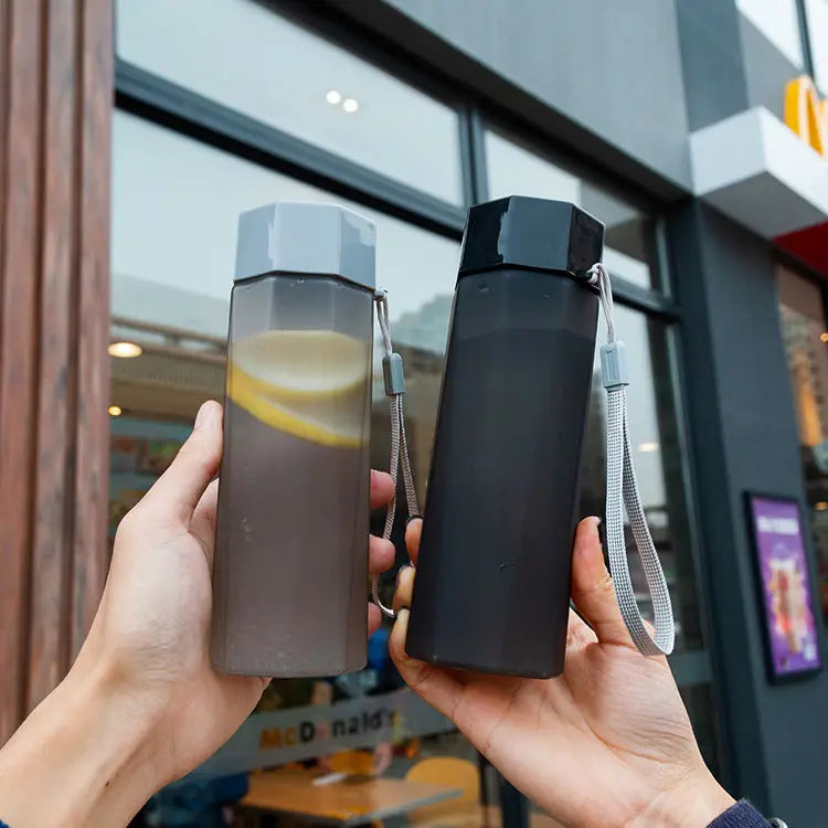 Portable Plastic Water Bottle Creative Matte Water Cup Outdoor Juice Leak-Proof Sports Bottle with Rope Travel Camping Bottles.