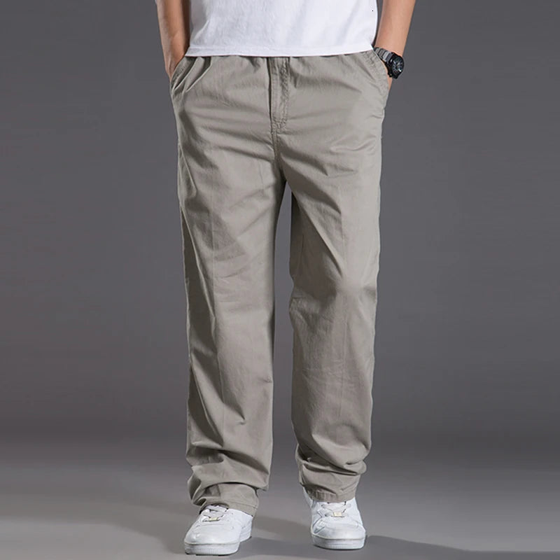 Mens casual Cargo Cotton pants men pocket loose Straight Pants Elastic Work Trousers Brand Fit Joggers Male Super Large Size 6XL.