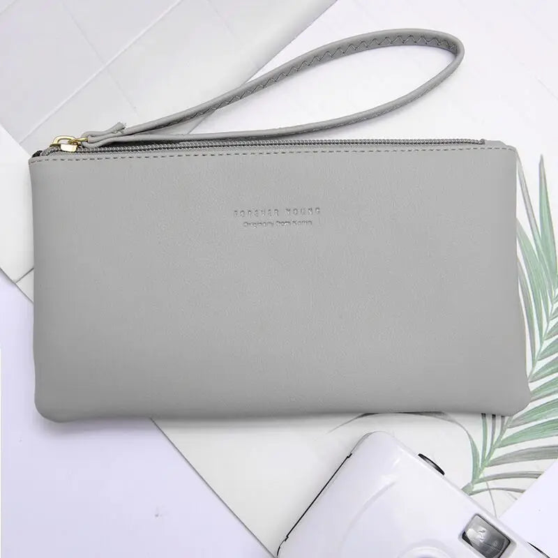 New mobile phone bag female long zipper coin purse female Korean version of pure color wild card bag mobile phone bag wallet.