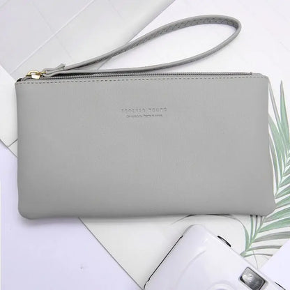 New mobile phone bag female long zipper coin purse female Korean version of pure color wild card bag mobile phone bag wallet.
