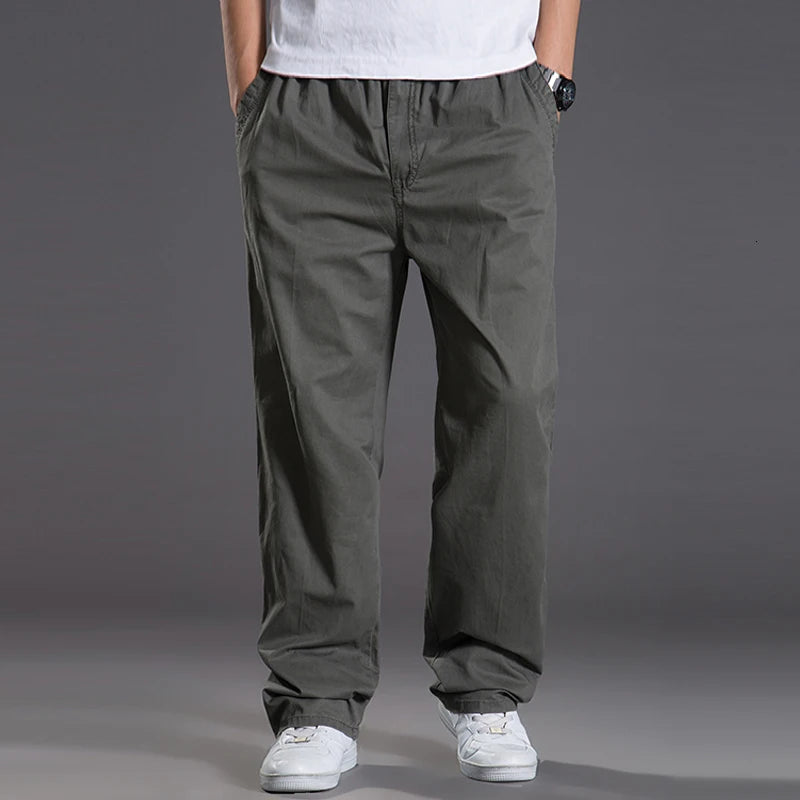 Mens casual Cargo Cotton pants men pocket loose Straight Pants Elastic Work Trousers Brand Fit Joggers Male Super Large Size 6XL.