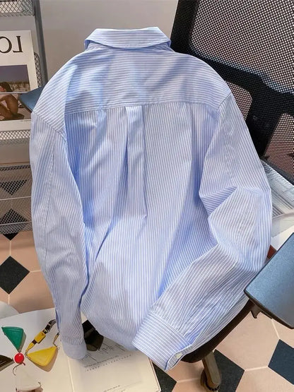 Wholesale 2025 Spring New Blue Long Sleeved Striped Shirts for Women Polo Neck Cool and Elegant Women's Shirts.