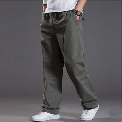 Mens casual Cargo Cotton pants men pocket loose Straight Pants Elastic Work Trousers Brand Fit Joggers Male Super Large Size 6XL.