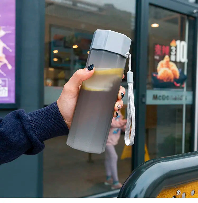 Portable Plastic Water Bottle Creative Matte Water Cup Outdoor Juice Leak-Proof Sports Bottle with Rope Travel Camping Bottles.