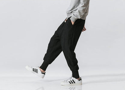 Cotton Linen Harem Pants Men Solid Elastic Waist Streetwear Joggers New Baggy Drop-crotch Pants Casual Trousers Men.