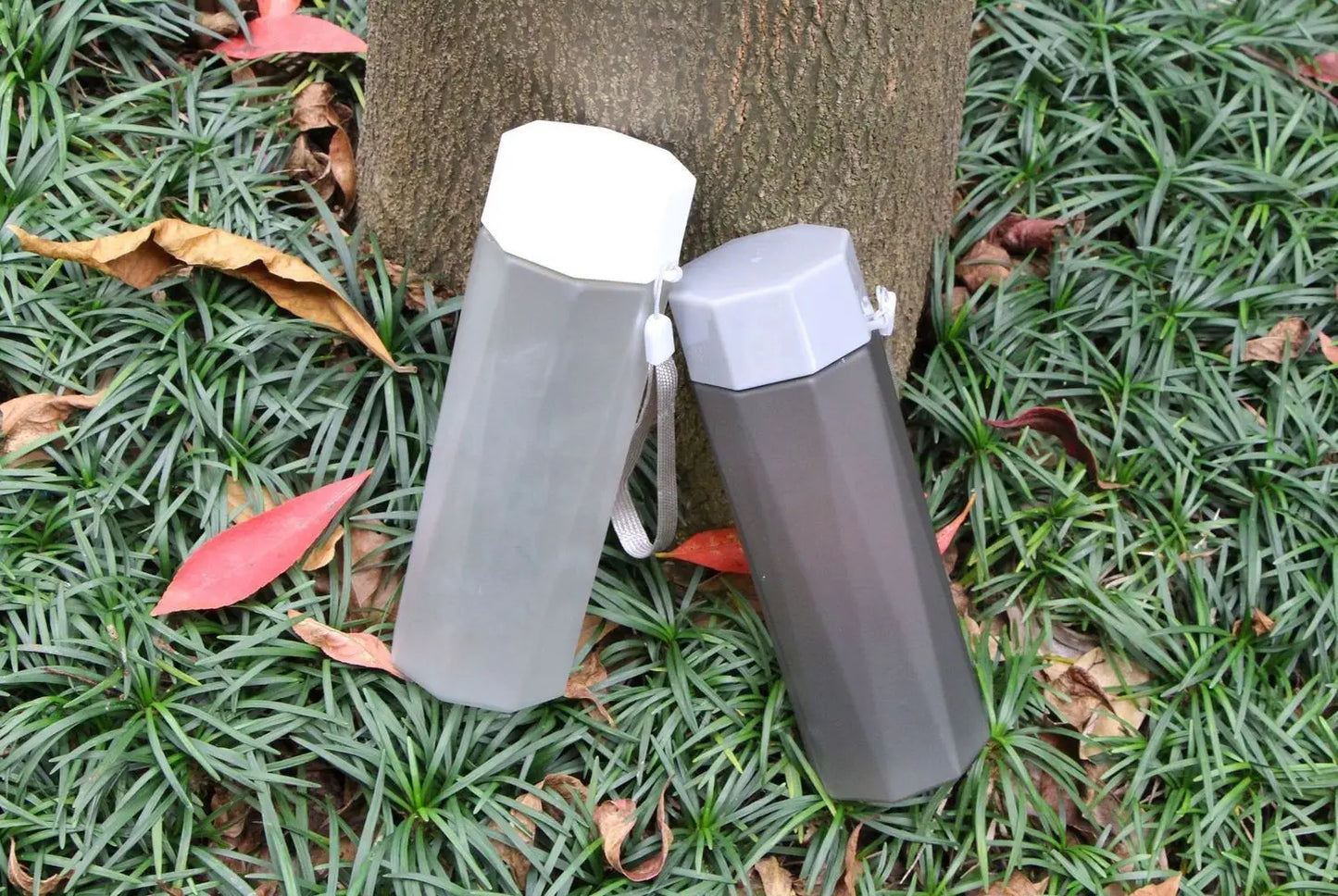 Portable Plastic Water Bottle Creative Matte Water Cup Outdoor Juice Leak-Proof Sports Bottle with Rope Travel Camping Bottles.