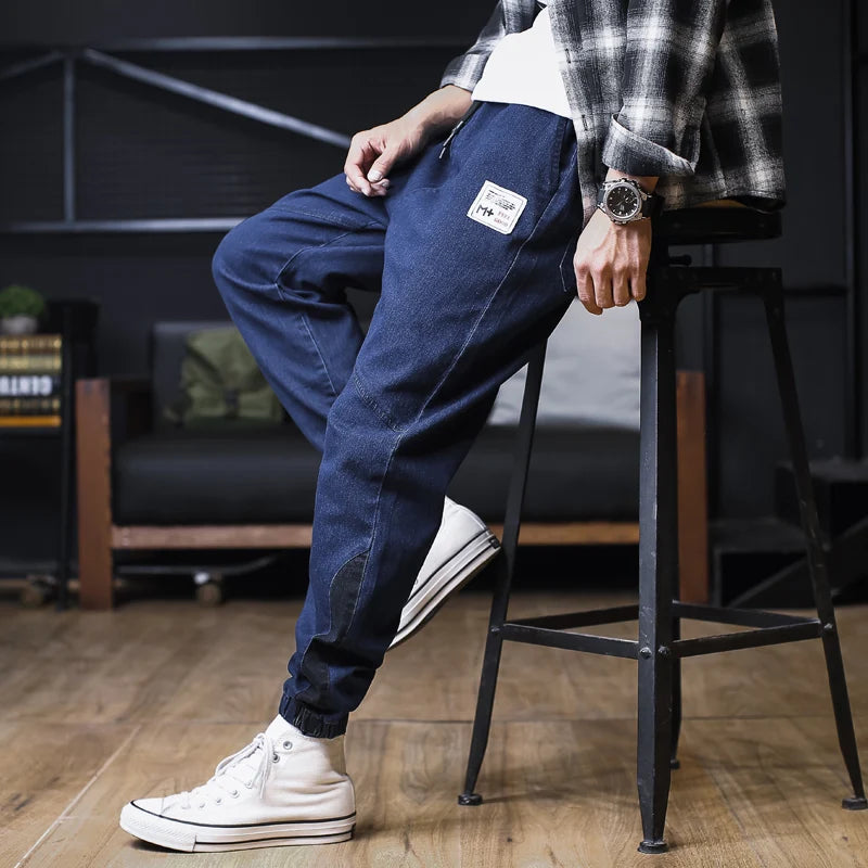 Plus Size Jeans Men Loose Joggers Streetwear Harem Jeans Cargo Pants Ankle-Length Denim Trousers.