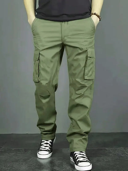 Men's casual multi pocket work pants with loose fit and drawstring waistband suitable for hikingfishingand outdoor exploration.
