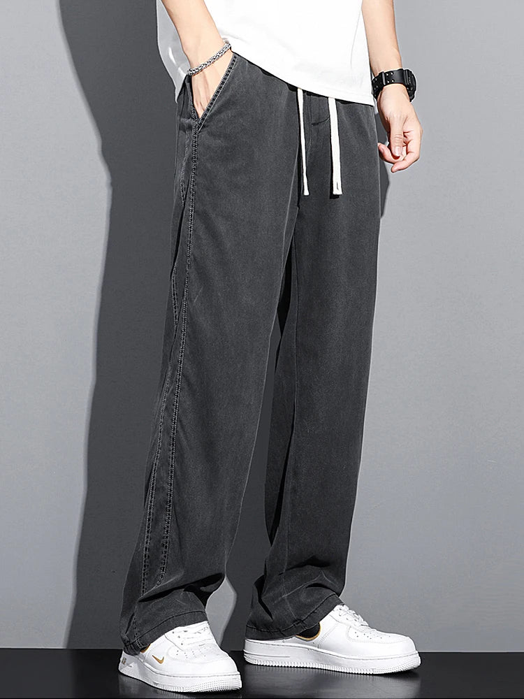 2024 Spring/Summer New Soft Lyocell Fabric Men's Jeans Thin Loose Straight Leg PantsDrawstring Elastic Waist Korean casual pants.