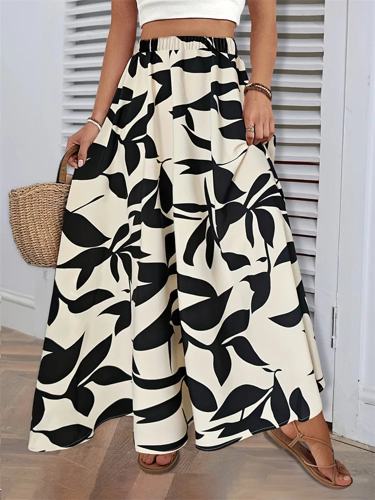Fairyshely Casual Leaf Print Long Skirt For Women 2025 Summer Ruffle High Waist Maxi Skirt Ladies Elegant A line Pleated Skirt.