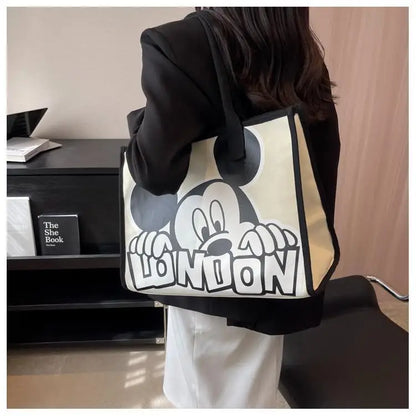 New Disney  Mickey Canvas Bag Women's Versatile Casual Shoulder Bag Commuter Handbag Large Capacity Multifunctional Mommy Bag.