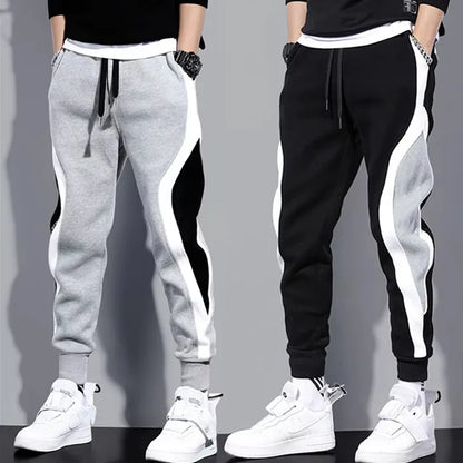 Autumn Men's Wide Loose Casual Pants Mens Patchwork Nine-point Sports  Elastic Rope Breathable Tie-foot Trousers.