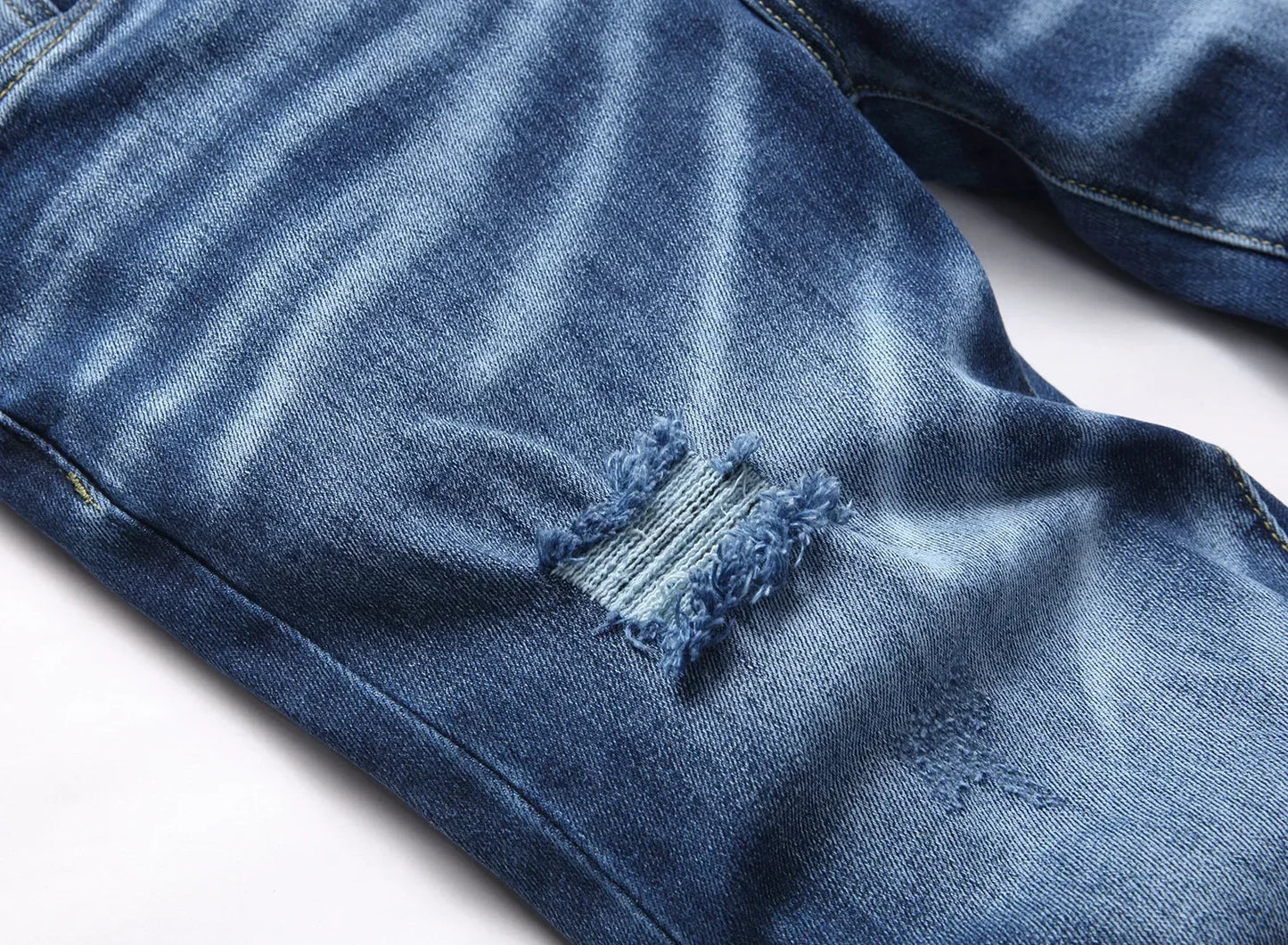 2025 Men's Ripped Jeans Luxury Brand Light Blue Holes Long Trousers Quality Male Fashion Stretch Slim Pants Men Skinny Jeans.