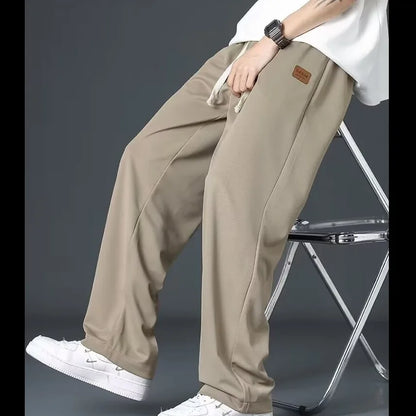 Casual long pants for boys, ice silk quick drying pants for spring and summer, thin, trendy brand straight tube, loose, hanging.