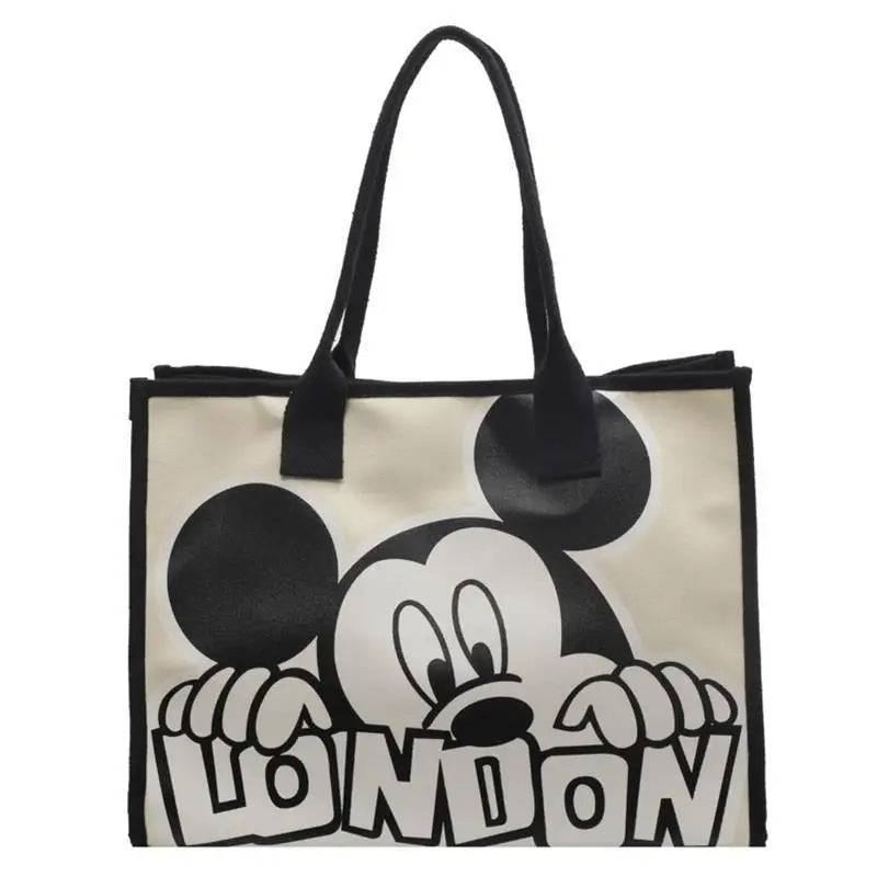 New Disney  Mickey Canvas Bag Women's Versatile Casual Shoulder Bag Commuter Handbag Large Capacity Multifunctional Mommy Bag.