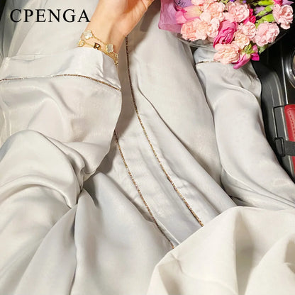 2024 Muslim Modest Cardigan for Women Eid Arab Abaya Dubai Dress Islamic Daily Long Sleeve Clothing Turkey Solid Color Coat Robe.