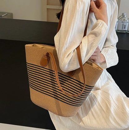 Straw bag bag women's summer inswind 2024 new beach seaside outdoor travel vacation large capacity shoulder bag.