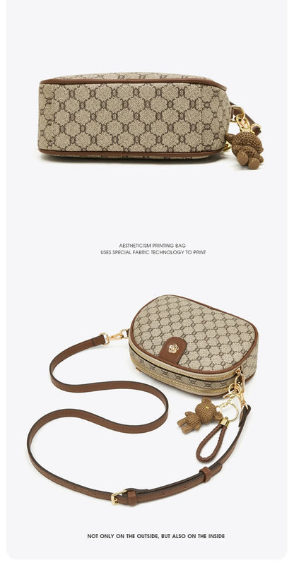 FOXER Women Small Shoulder Bag Fashion Monogram PVC Lady Crossbody Handbag with Adjustable Strap.