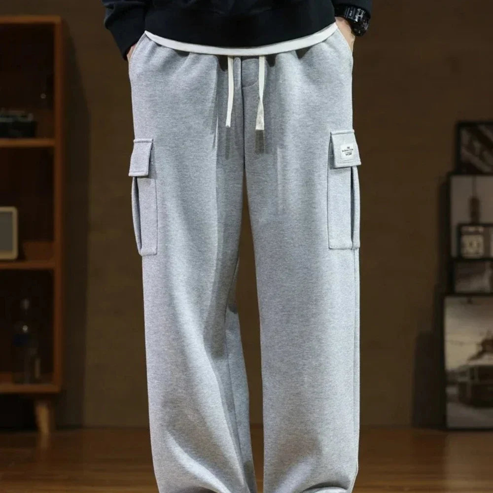 Männer Casual Hosen Neue Jogginghose Männer Multi-Taschen Kordelzug Baumwolle Beiläufige Breite Hosen Männliche Lose Gerade Hosen Größe 8XL.