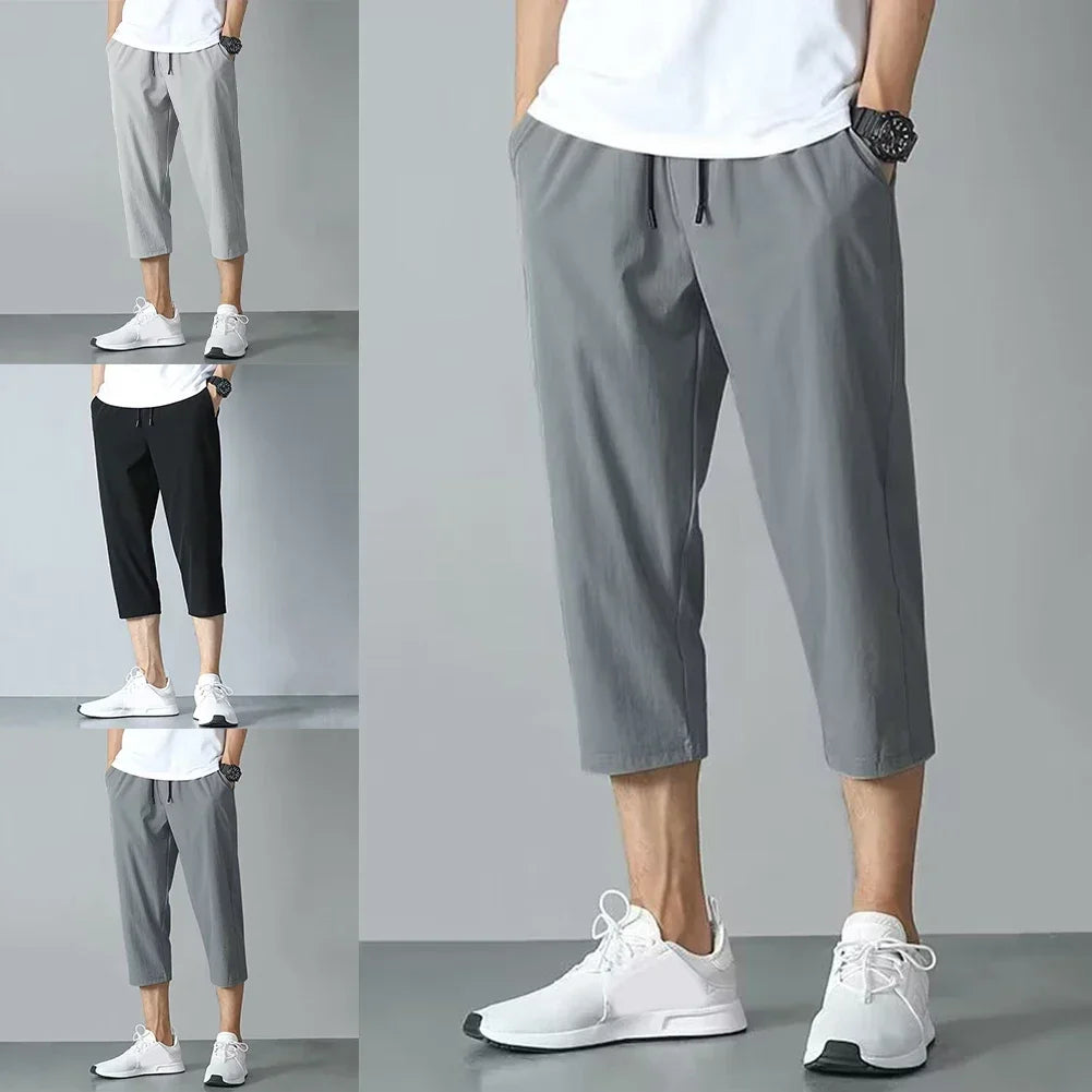 2025 New Summer Men's Ice Silk Pants Hong Kong Style Trendy Loose-Fit Straight-Leg Cropped Pants Korean Version Casual Pants.