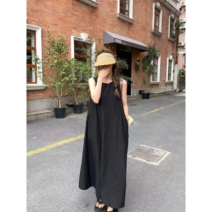 Elegantes ärmelloses langes Westenkleid für Damen, lockerer Rücken, hohles Design, Rundhalsausschnitt, Frühlingsausflugskleid, Prinzessinnenärmel, Polokragen.