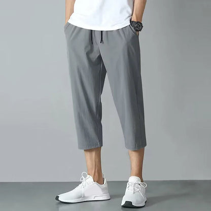 2025 New Summer Men's Ice Silk Pants Hong Kong Style Trendy Loose-Fit Straight-Leg Cropped Pants Korean Version Casual Pants.