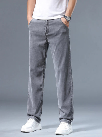 Summer Thin Men's Loose Straight Jeans Lyocell Soft Drape Business Casual Trousers Classic Smoke Gray Brand Ice Silk Pants.