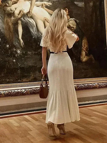 Frauen solide plissierte Saum Patchwork langes Kleid elegante Rundhals ausschnitt kurze Ärmel einreihige Dame Roben 2024 Sommer Streetwear.