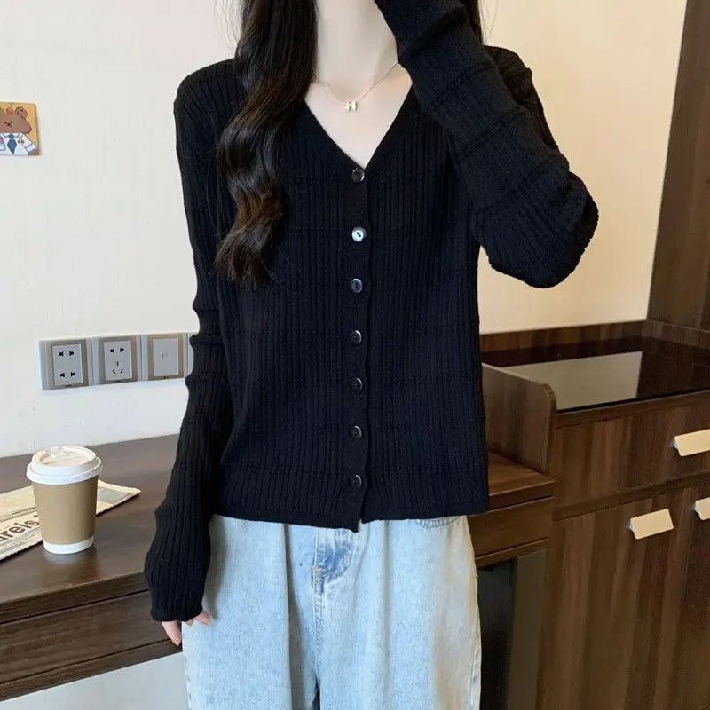 Women's Long-sleeved Button Cardigan Solid Color Casual Loose Fashion Top.