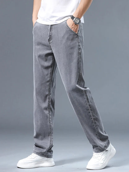 Summer Thin Men's Loose Straight Jeans Lyocell Soft Drape Business Casual Trousers Classic Smoke Gray Brand Ice Silk Pants.