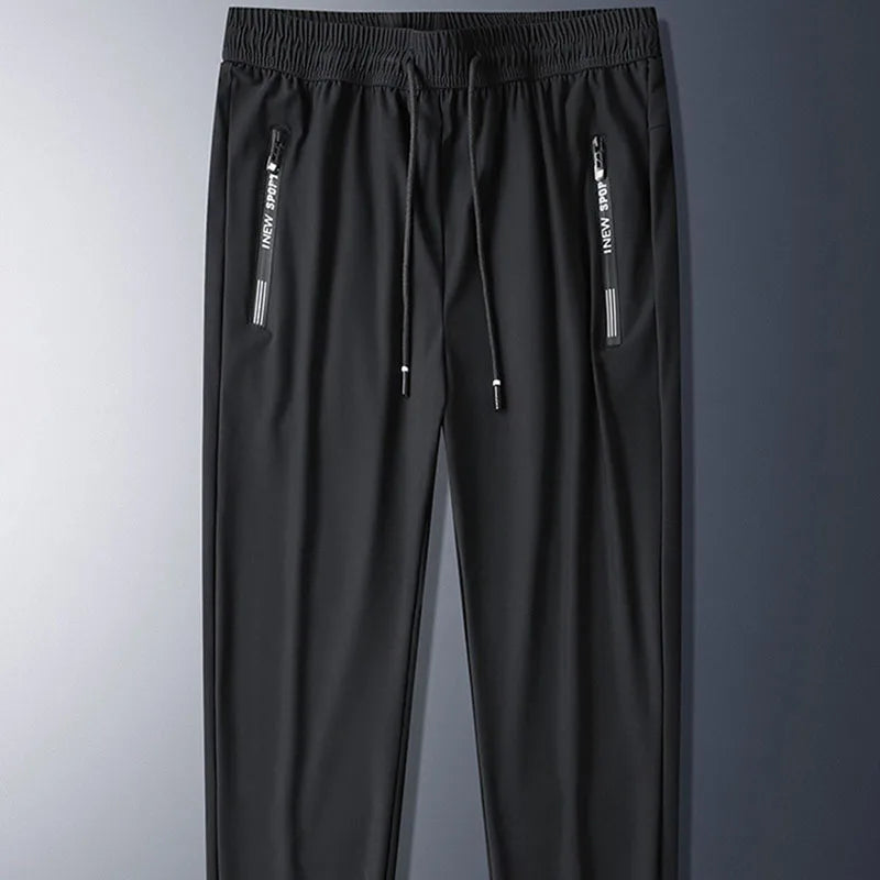 1pcs Summer Men Cool Loose Pants Men's Plus Szie Sweatpants Fashion Casual Stretch Pants Male Big Size Working Clothes Trousers.