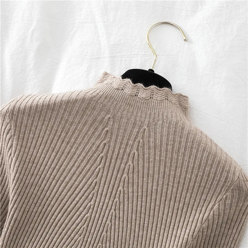 2026 weibliche Dünne Koreanische Strickwaren Tops Herbst Winter Pullover Frauen Hohl-out Pullover Langarm Rollkragenpullover.