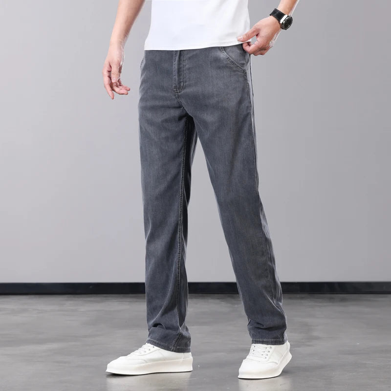 Summer Thin Men's Jeans Lyocell Fabric Soft Breathable Straight Denim Pants Brand Man Elastic Ice Silk Casual Trousers Grey Blue.