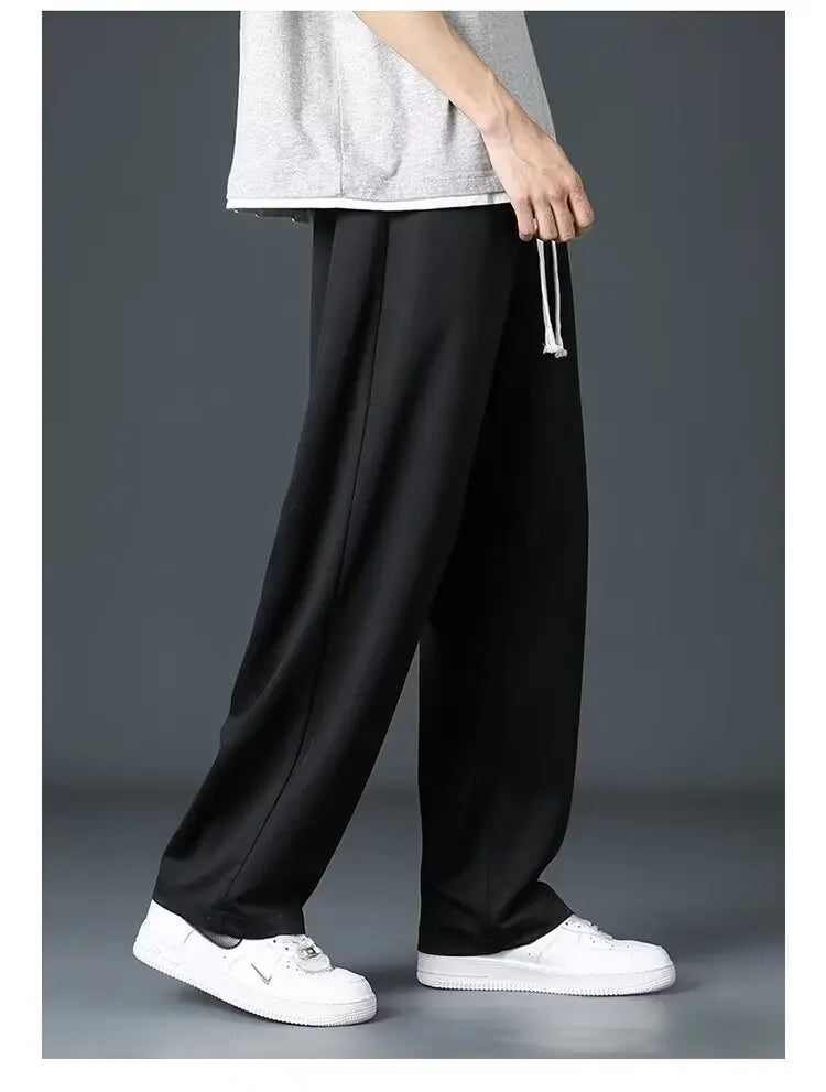 Casual long pants for boys, ice silk quick drying pants for spring and summer, thin, trendy brand straight tube, loose, hanging.