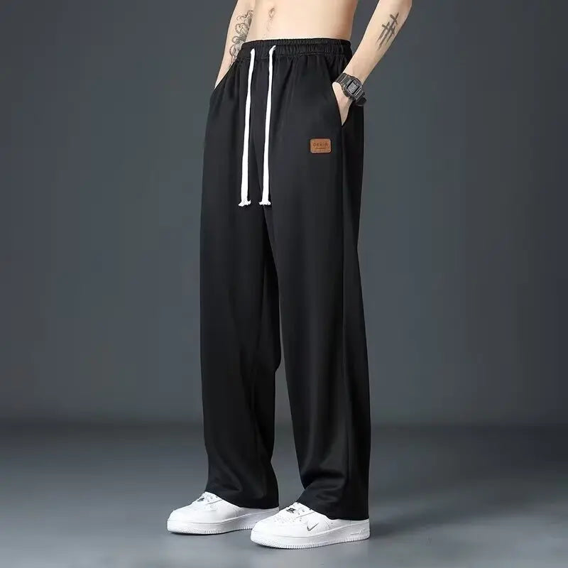 Casual long pants for boys, ice silk quick drying pants for spring and summer, thin, trendy brand straight tube, loose, hanging.