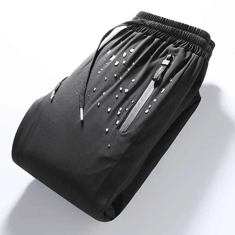 Luxury Winter Thick Warm Windproof Waterproof White Duck Down Pants Men New Down Pants Outward Wearing Cold Proof Sports Pants.