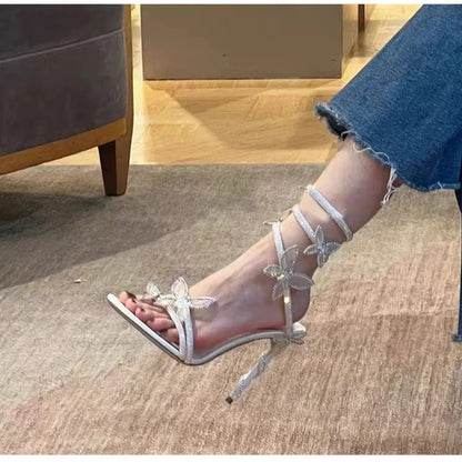 Luxury Crystal Embellished Butterfly Detail Women Sandals Sexy Coiled Strap Thin High heels Gladiator sandals Summer Party Shoes.