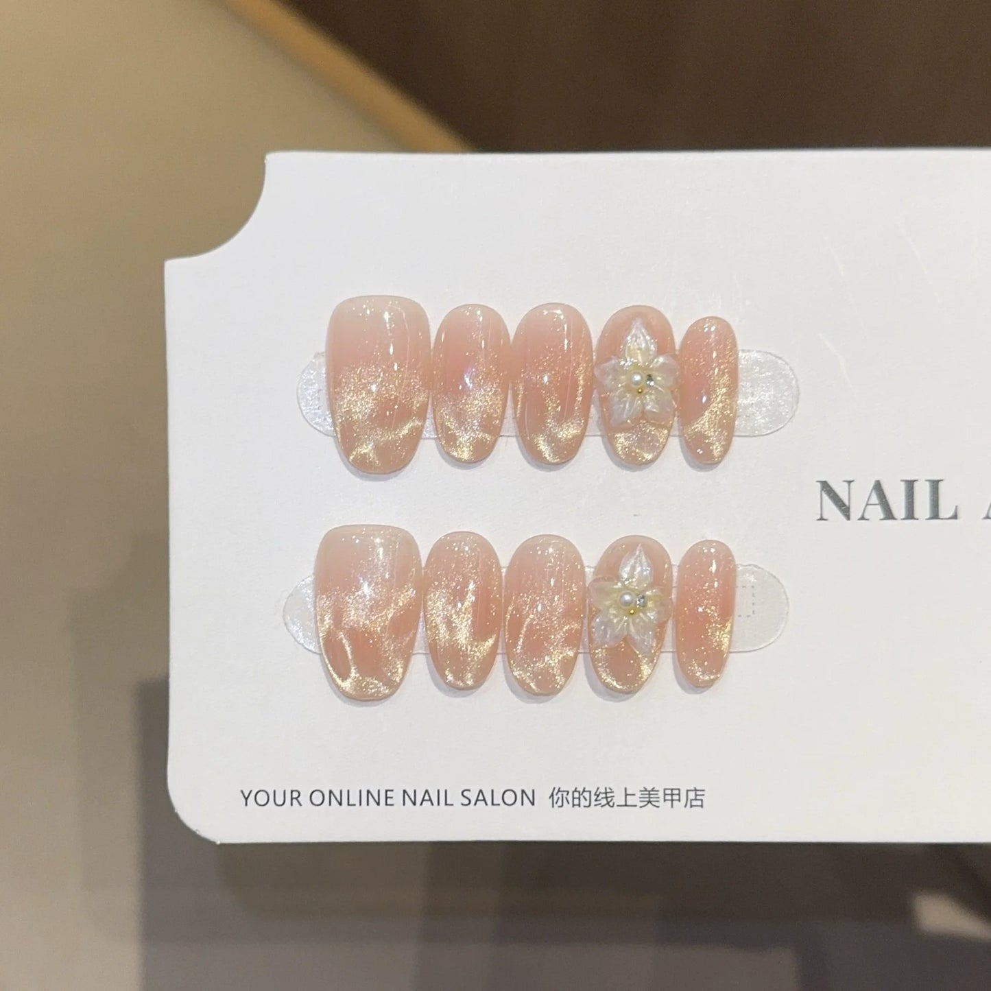 10Pcs mid-length oval White Moonlight Cat Eyes Nails Sliver Bowknot Press on False Nails with Pearl Diamond Full Cover Nail Tips.