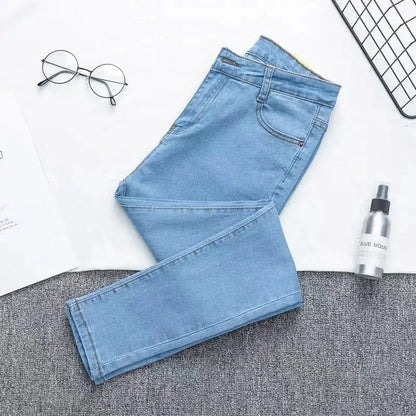 High Waist plus Size Denim Jeans Women's Fitting Pencil Pants Elastic Casual Long Trousers Light Blue Spring Autumn Wear.